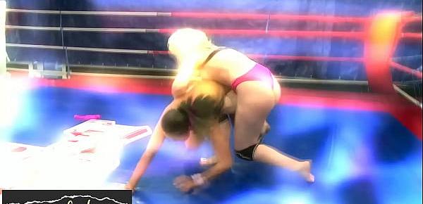 Busty wrestling dykes dildoed during catfight